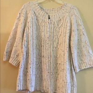 Zip up cardigan sweater.